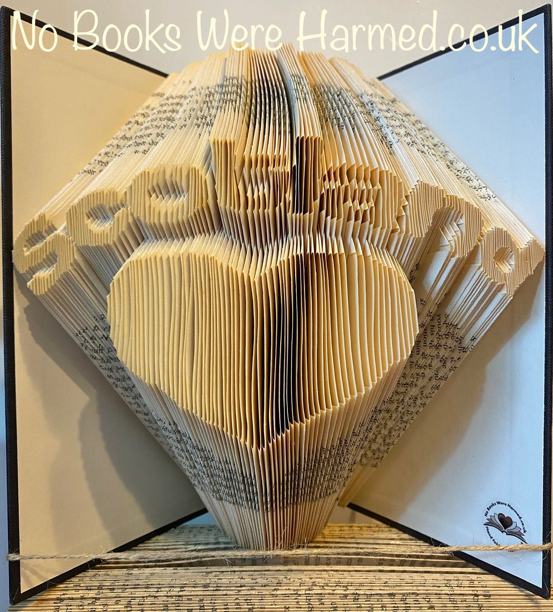 Hand-folded book art featuring the word 'Scotland' over a love heart, crafted from vintage book pages.